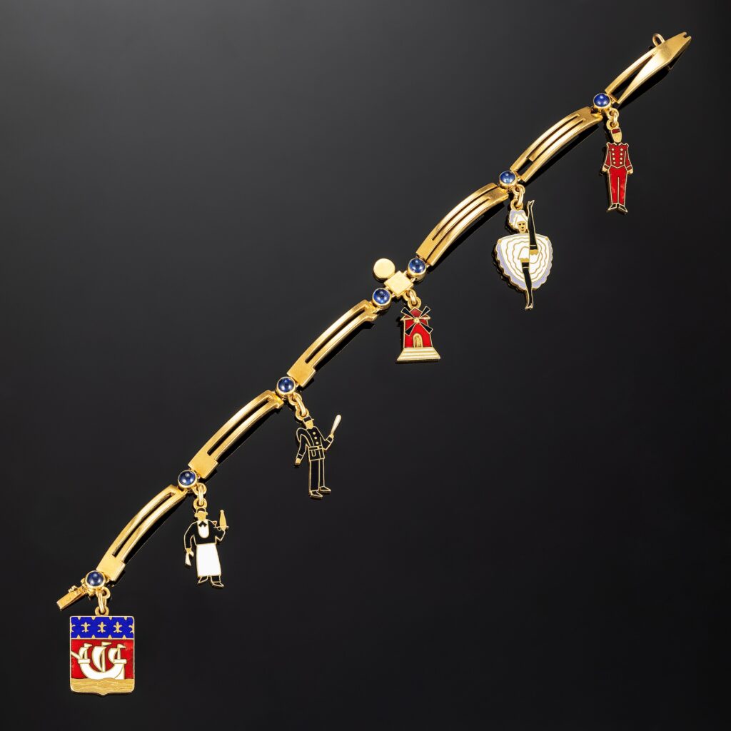 Cartier Art Deco ‘Paris 37’  Enamel and Sapphire Charm Bracelet in 18K Yellow Gold, circa 1937